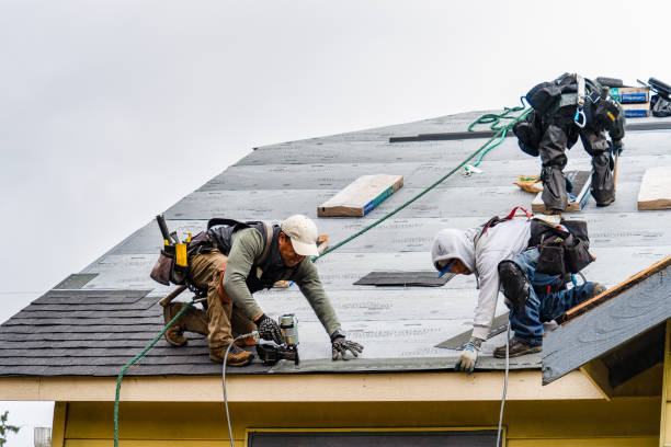 Professional Roofing technician working in Stamford, CT